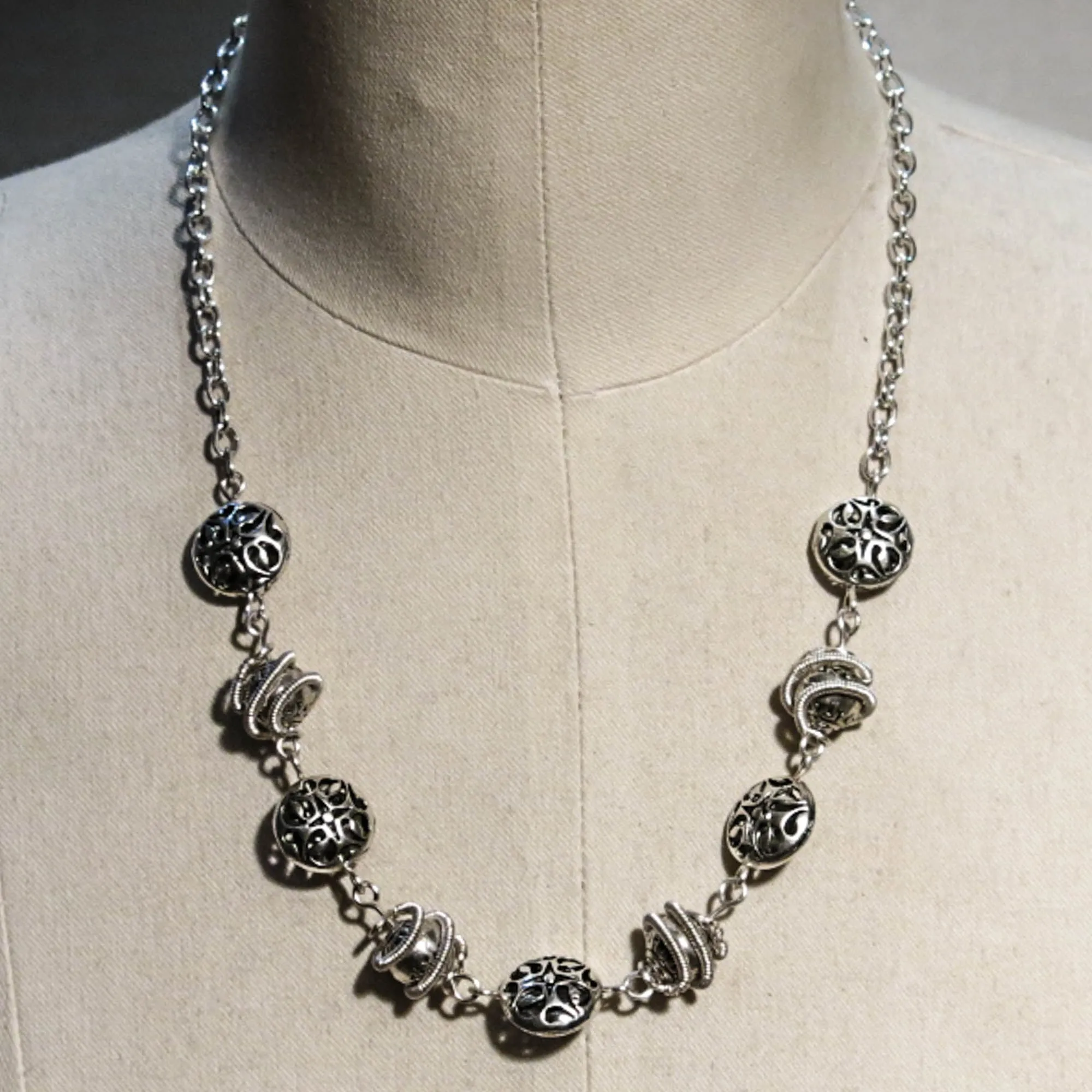 Vintage-Inspired Silver Bead Necklace with Intricate Metalwork